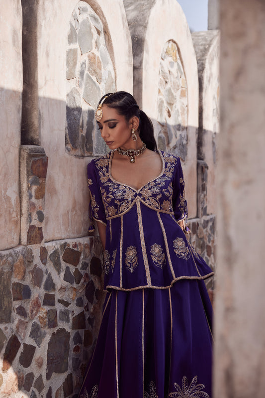Purple ombre satin georette lehnga with organza dupatta and satin georgette embroidered peplum blouse.