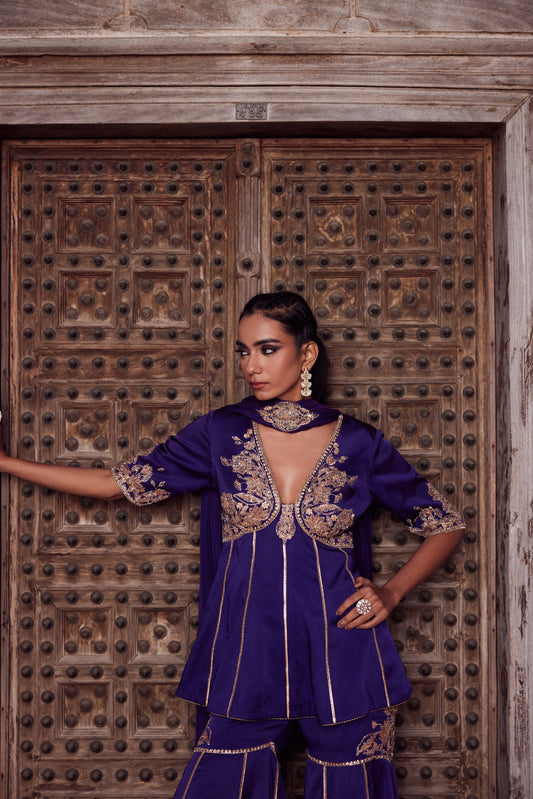 Purple ombre shaded satin georgette peplum kurti set with organza dupatta and satin georgette gharara.