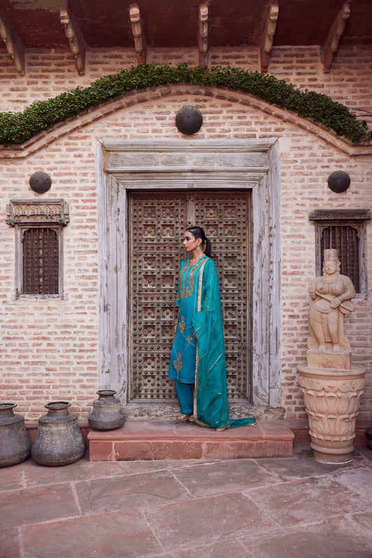 Teel turquoise ombre dyed satin georgette kurta set with organza dupatta and satin georgette pants.