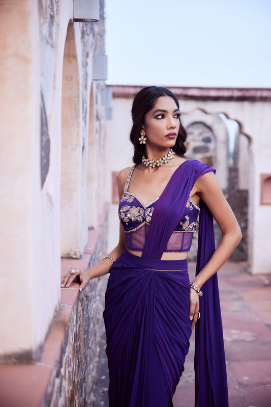 Purple ombre georgette pre stitched drape sari with a corset blouse in satin georgette.