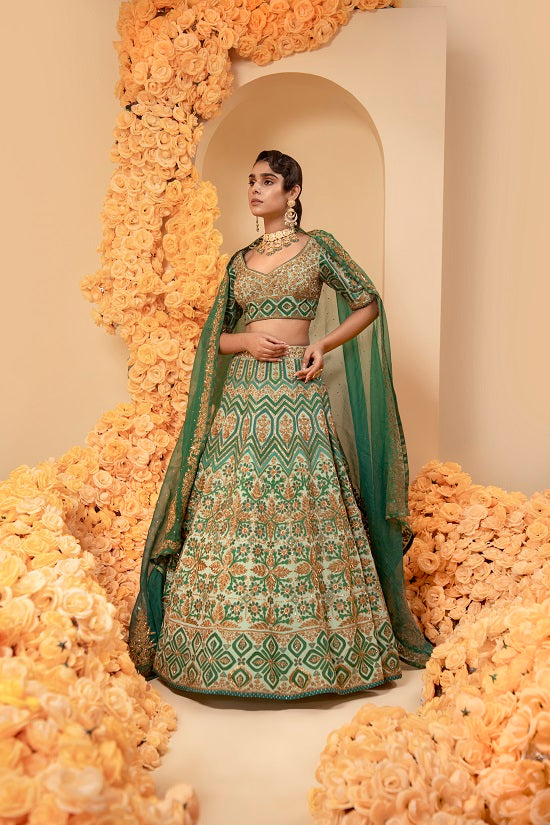 Aqua green crepe lehnga set with organza dupatta