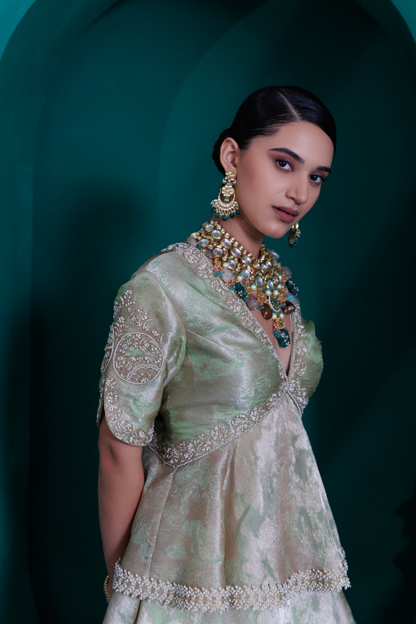 Mint green Jacquard zari organza peplum blouse and skirt set