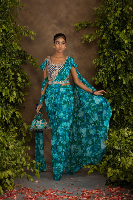 Blue floral printed drape saree with navy blue raw silk blouse