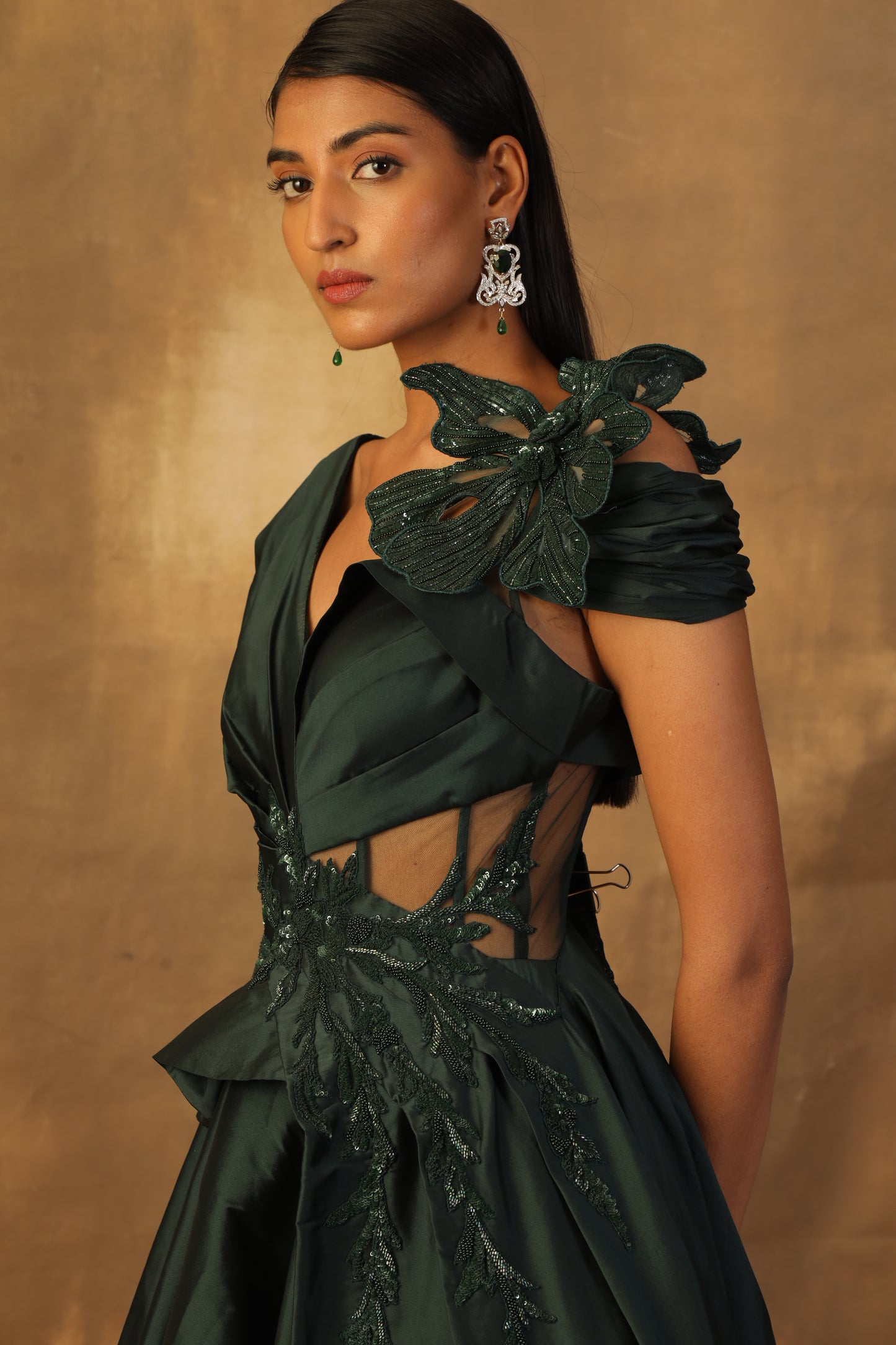 Bottle green tafeta gown embroidered with sequin and beads