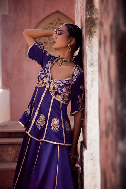 Purple ombre satin georette lehnga with organza dupatta and satin georgette embroidered peplum blouse.
