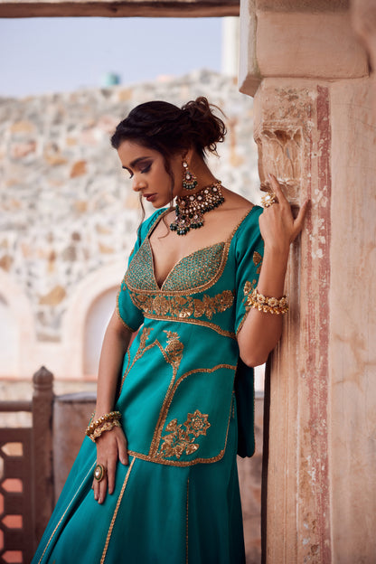 Teel turquise ombre satin georgette lehnga with organza dupatta and satin georgette embroidered long blouse.