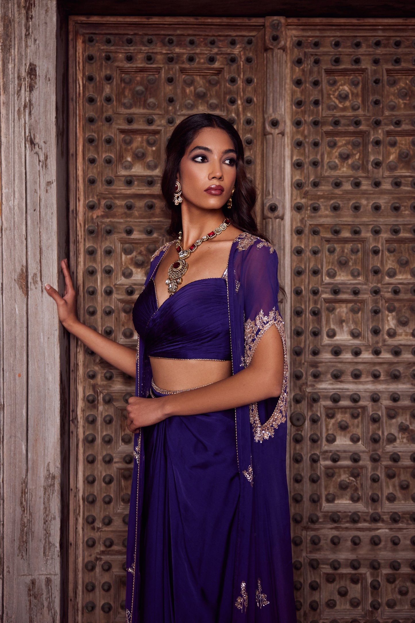 Purple ombre organza georgette cape set with rooshing purple bustier and satin georgget drape skirt.