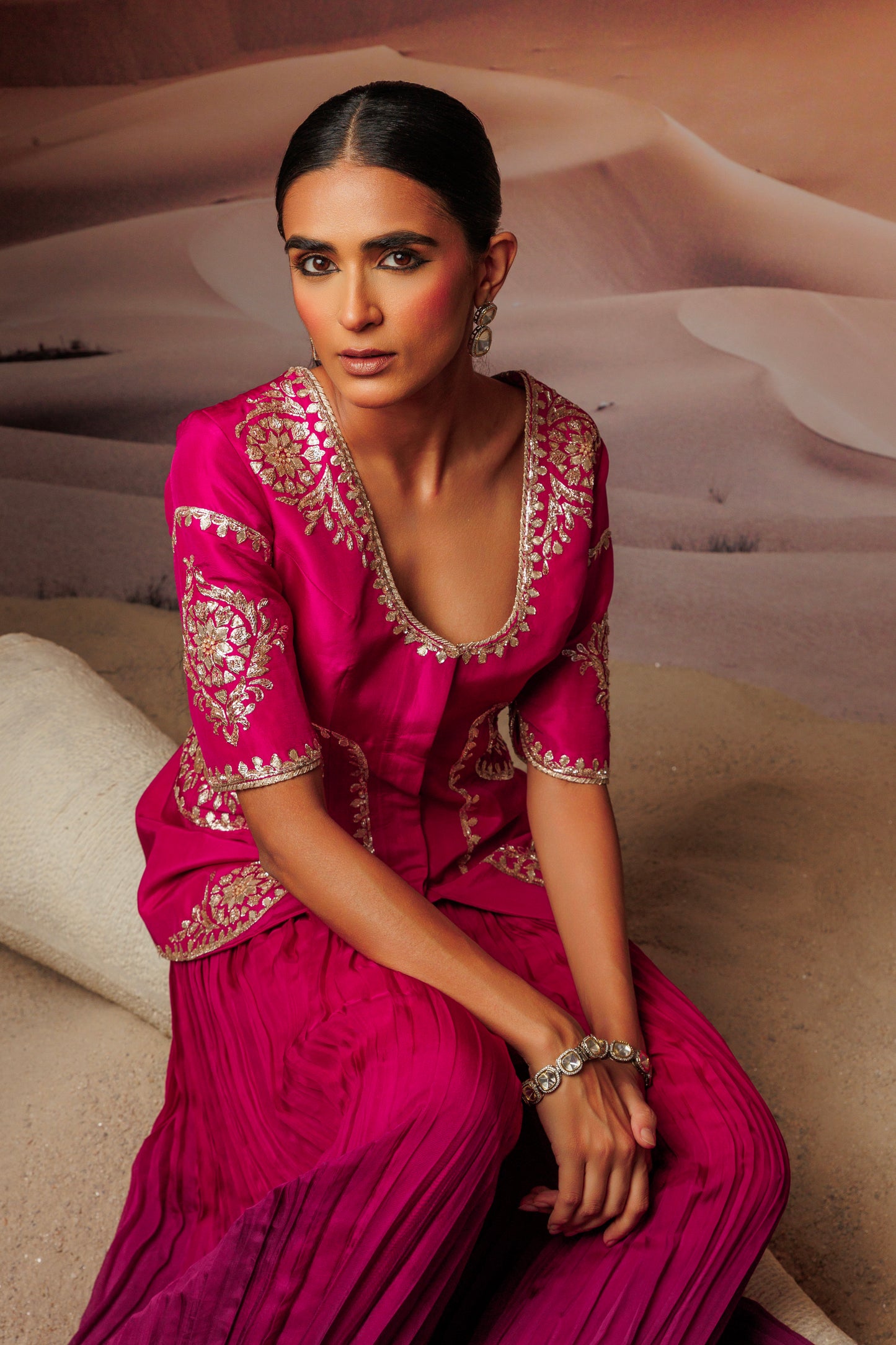 Fuschia embroidered jacket top and fushcia purple pleated palazo pant
