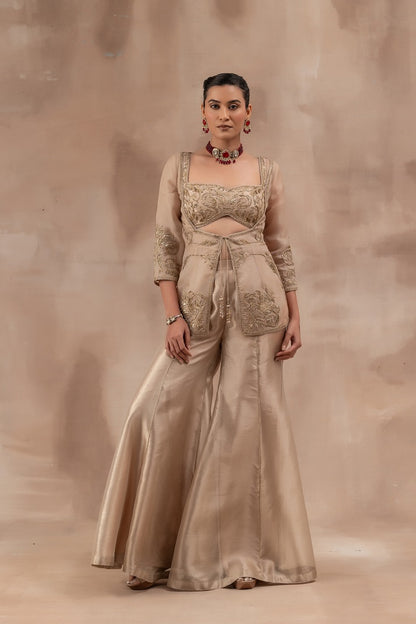 Beige gold silk bustier set with flare tissue flare panel pants and organza jacket