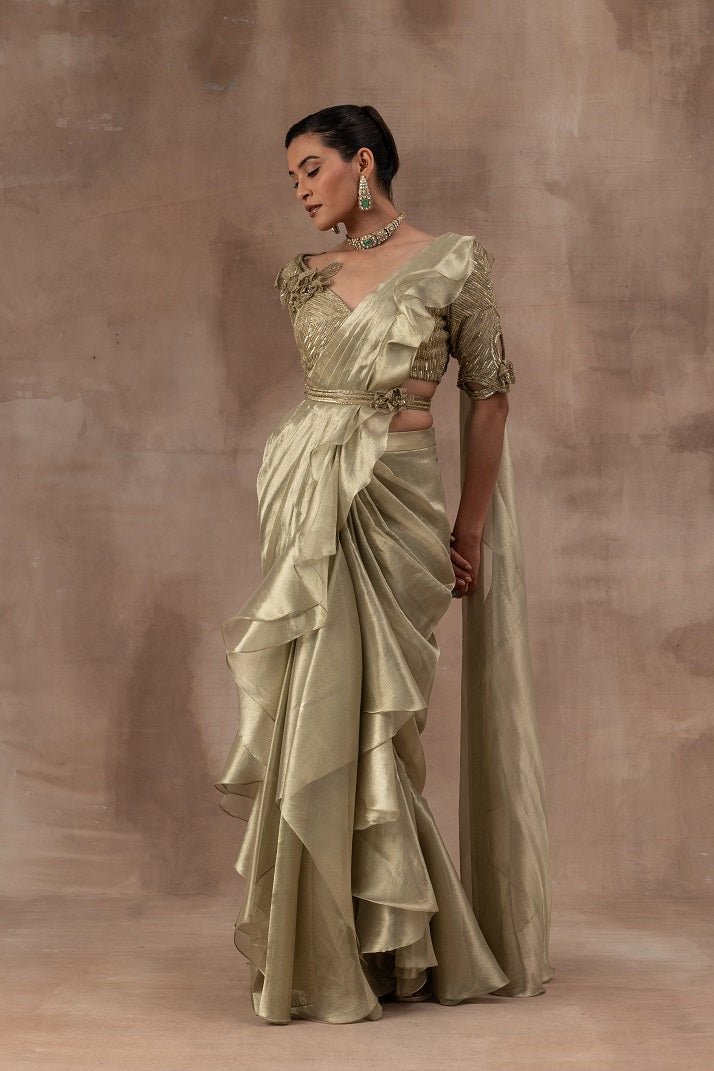 Metal green tissue drape sari with frills combined with blouse and waist belt