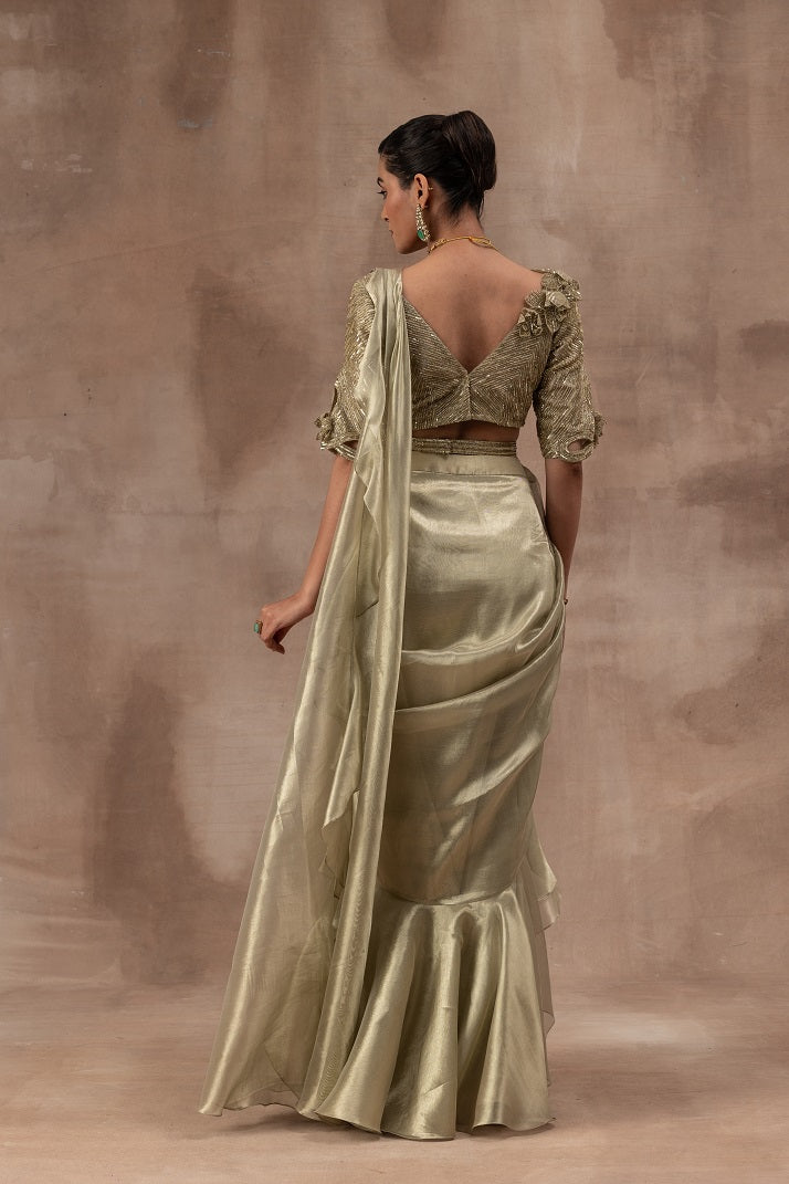 Metal green tissue drape sari with frills combined with blouse and waist belt