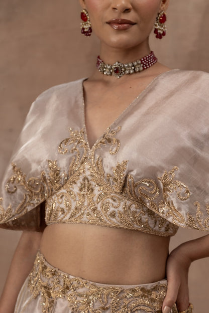 Rose gold tissue butterfly sleeve blouse with tissue skirt