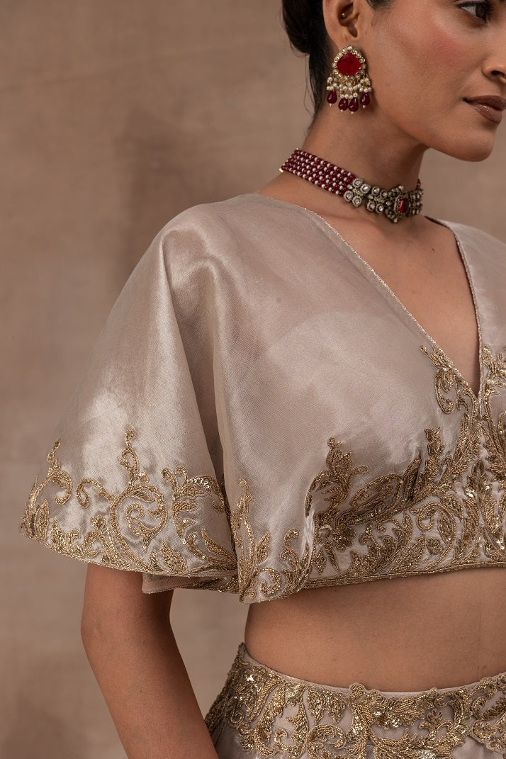 Rose gold tissue butterfly sleeve blouse with tissue skirt