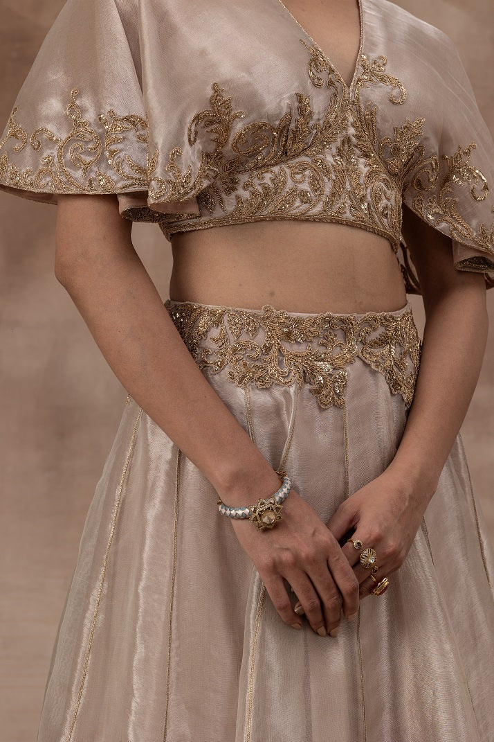 Rose gold tissue butterfly sleeve blouse with tissue skirt