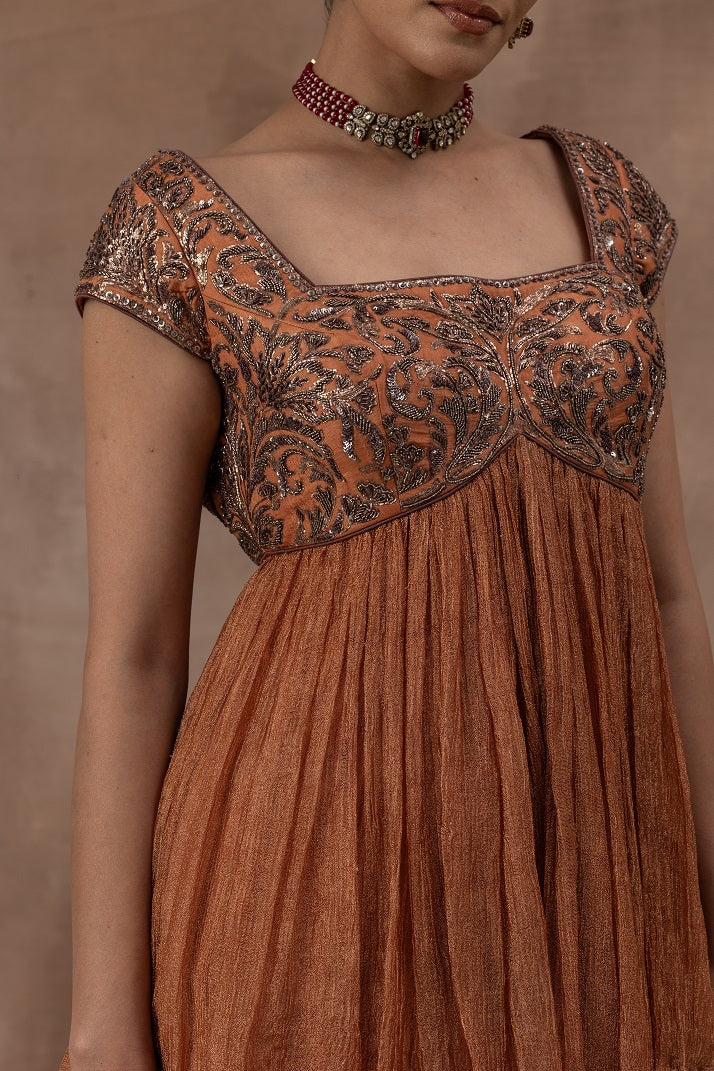 Peplum top with opada silk yoke in copper colour with tissue flare