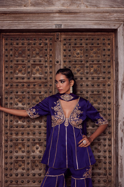 Purple ombre shaded satin georgette peplum kurti set with organza dupatta and satin georgette gharara.