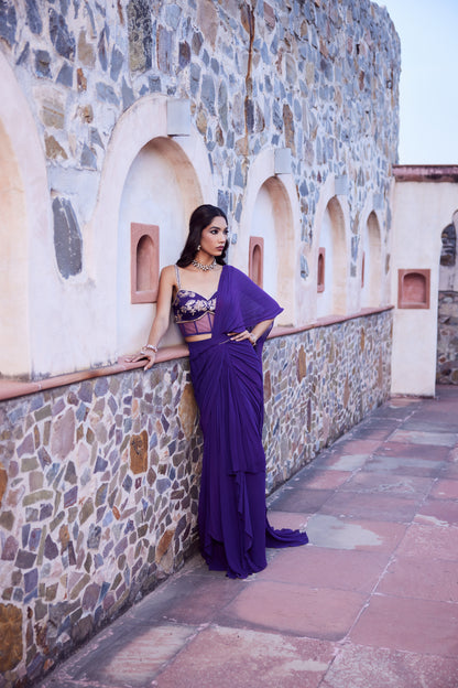 Purple ombre georgette pre stitched drape sari with a corset blouse in satin georgette.
