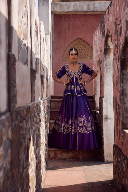 Purple ombre satin georette lehnga with organza dupatta and satin georgette embroidered peplum blouse.