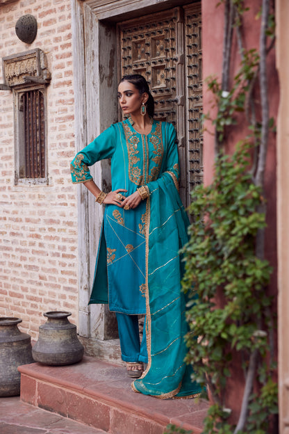 Teel turquoise ombre dyed satin georgette kurta set with organza dupatta and satin georgette pants.