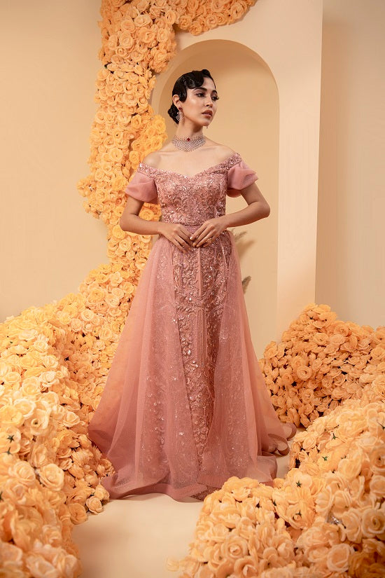 Straight gown in rose gold colour made on net with satin lining