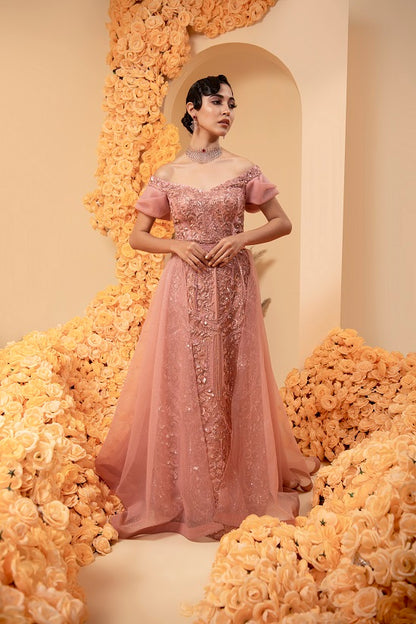 Straight gown in rose gold colour made on net with satin lining