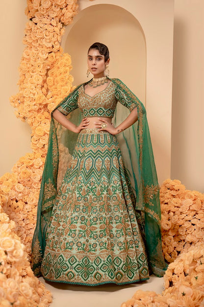 Aqua green crepe lehnga set with organza dupatta