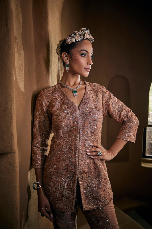 Dusty gold silk tissue jacket set with flare pants.
