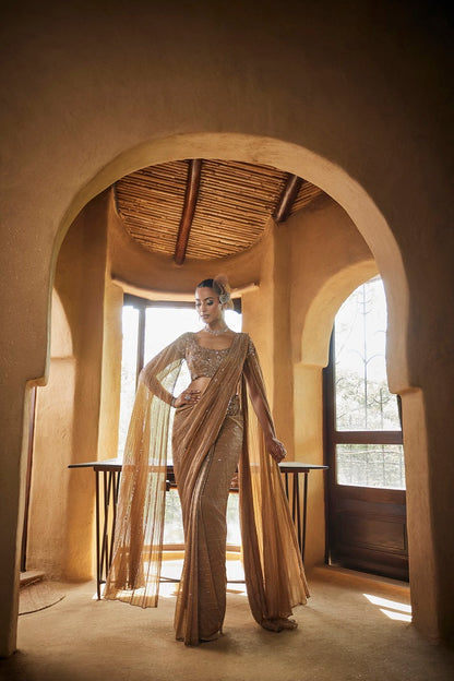Beige gold tissue drape sari set with cape sleeve blouse and pre daped sari