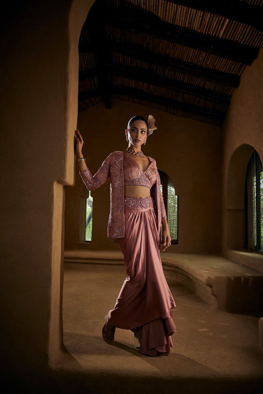 Rose gold silk tissue jacket with a rooshing blouse and satin drape skirt
