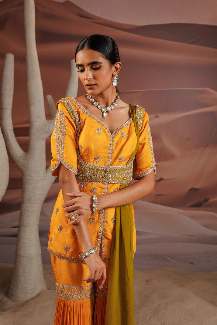 Opada silk short yellow kurti with half sleeve and a choli