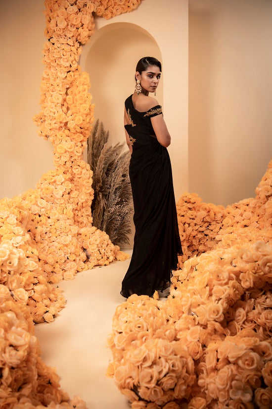 Black georgette drape gown with rooshing and antique zari embroidery
