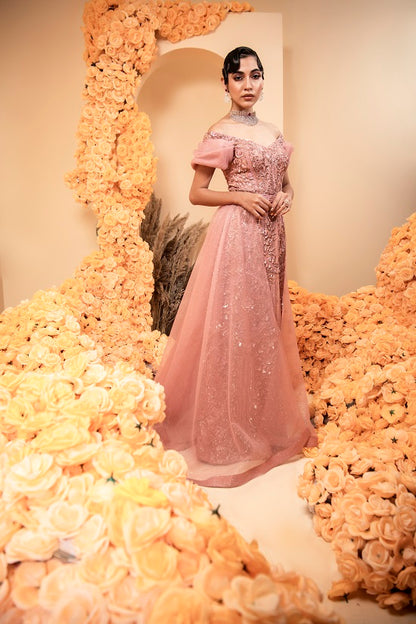 Straight gown in rose gold colour made on net with satin lining