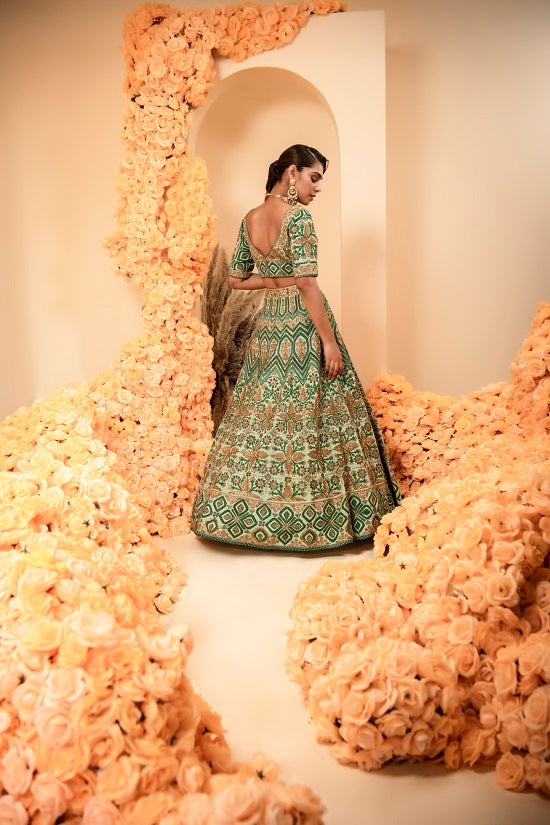 Aqua green crepe lehnga set with organza dupatta