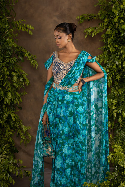 Blue floral printed drape saree with navy blue raw silk blouse