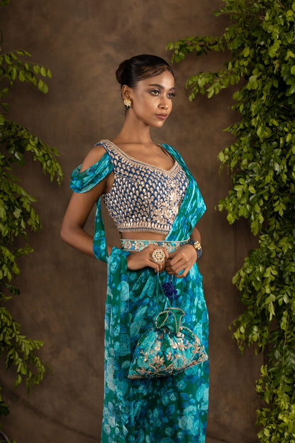 Blue floral printed drape saree with navy blue raw silk blouse