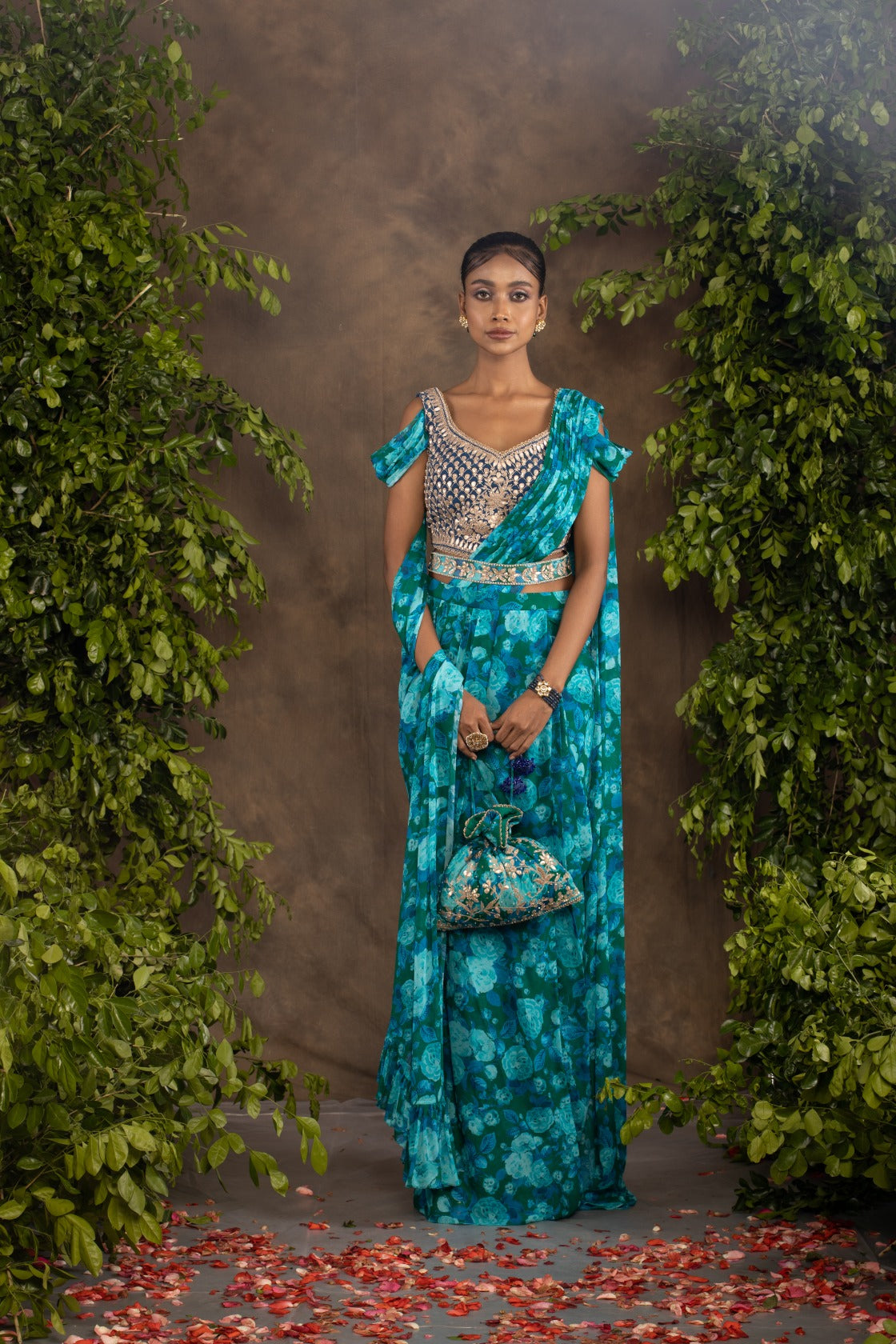 Blue floral printed drape saree with navy blue raw silk blouse