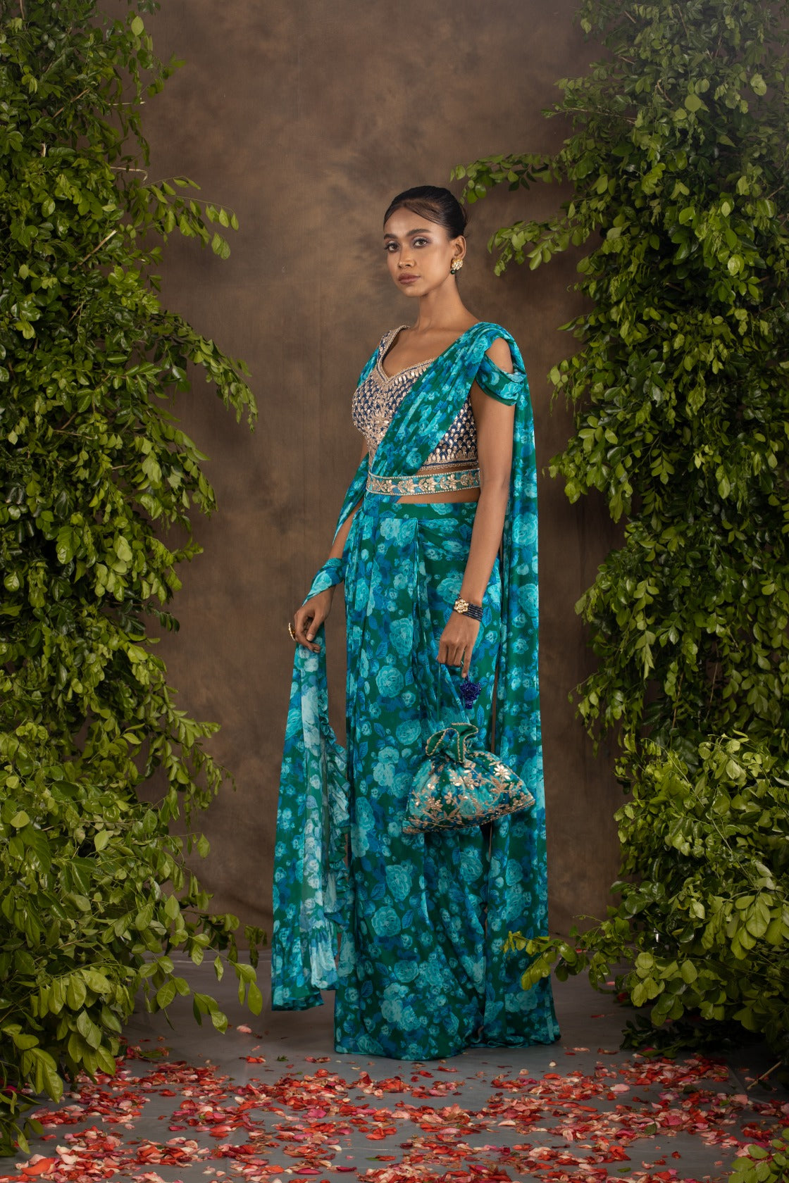 Blue floral printed drape saree with navy blue raw silk blouse