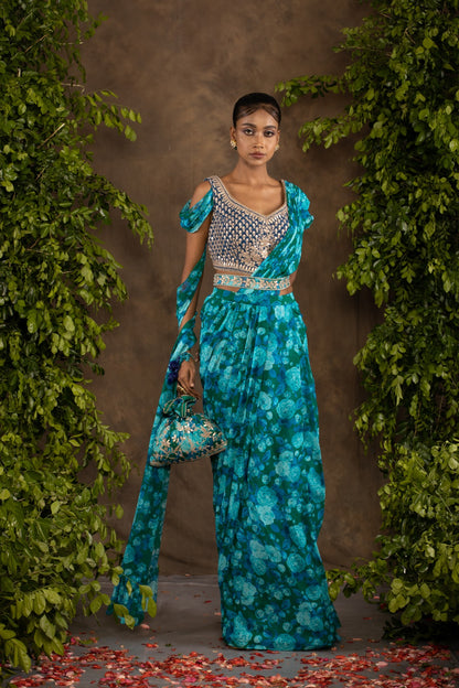 Blue floral printed drape saree with navy blue raw silk blouse