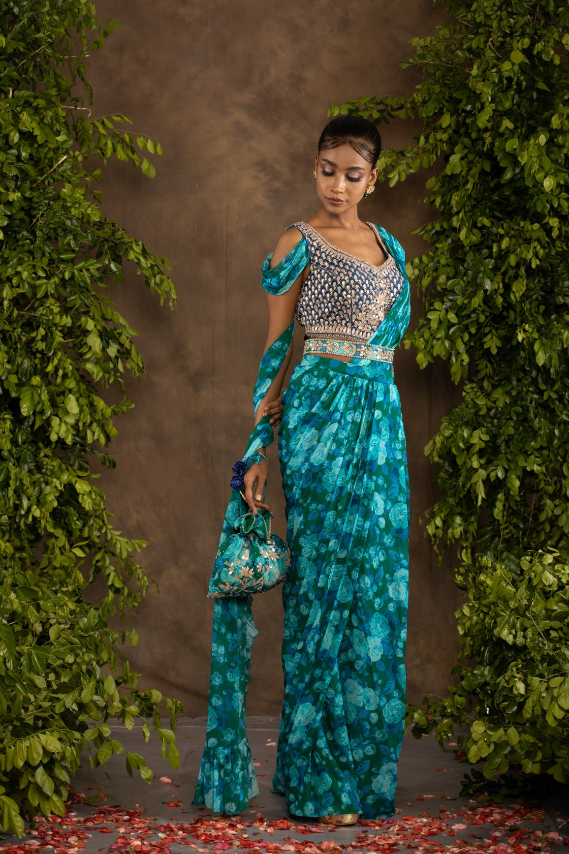 Blue floral printed drape saree with navy blue raw silk blouse