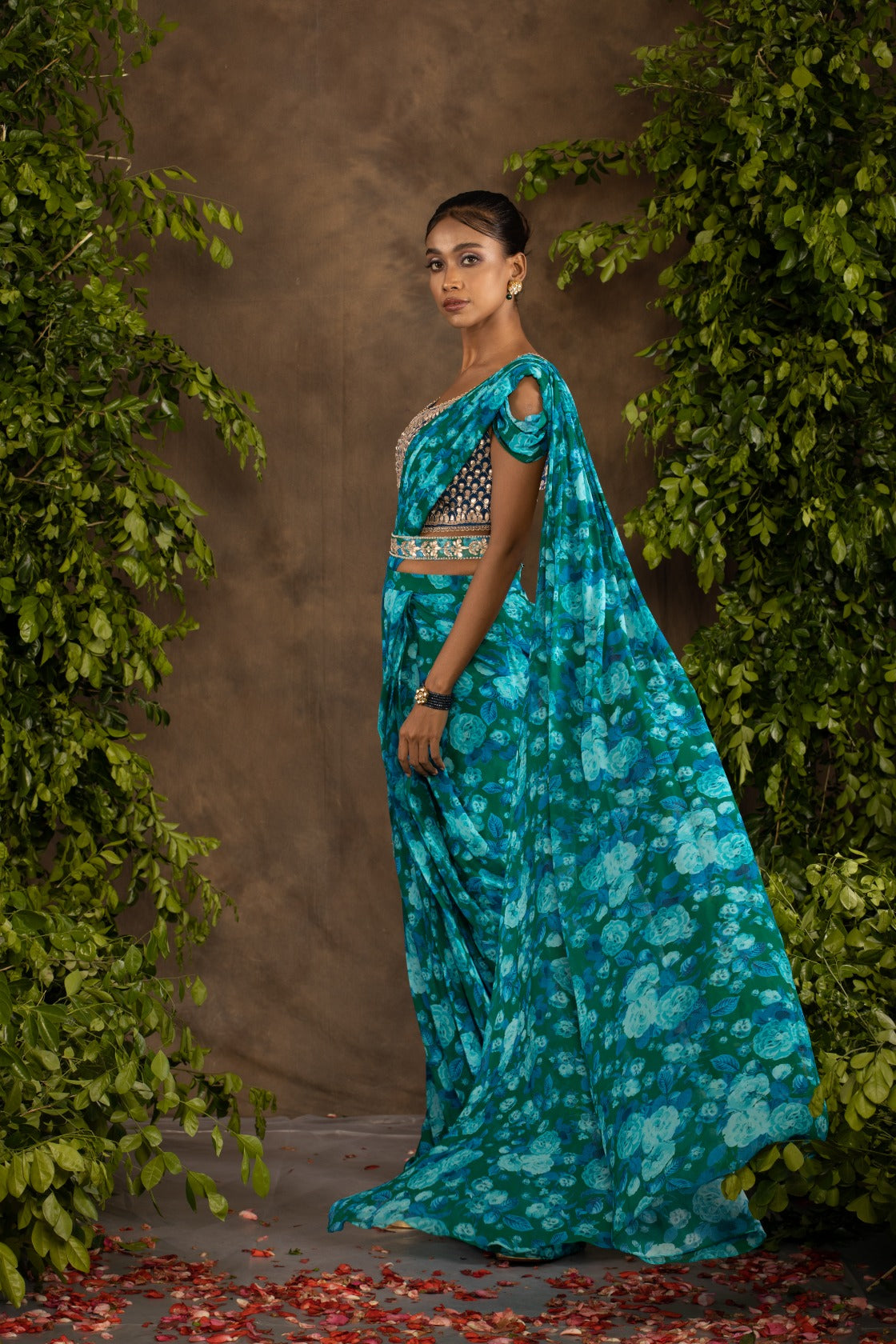 Blue floral printed drape saree with navy blue raw silk blouse