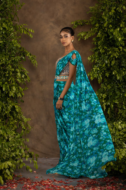 Blue floral printed drape saree with navy blue raw silk blouse