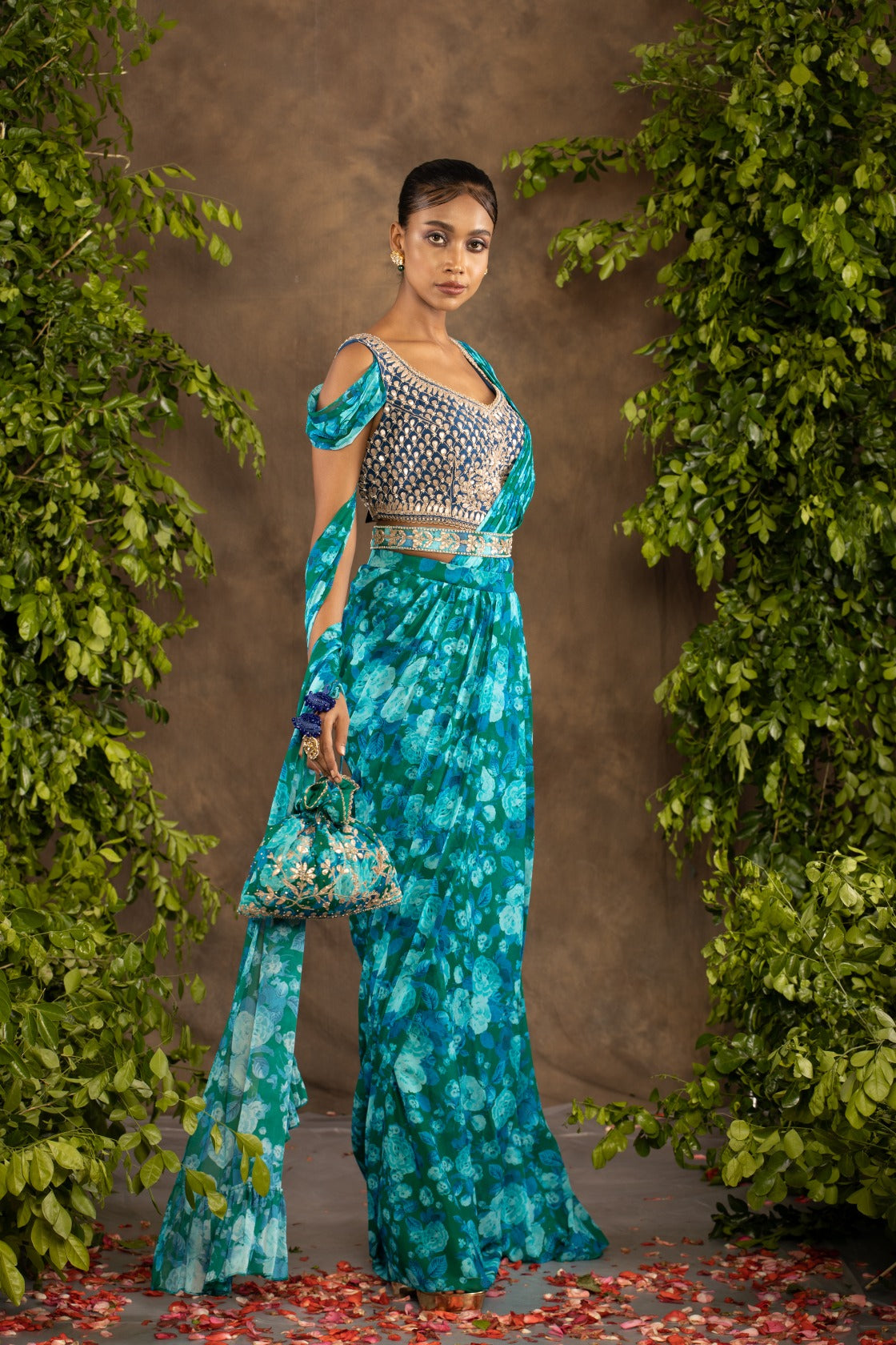Blue floral printed drape saree with navy blue raw silk blouse