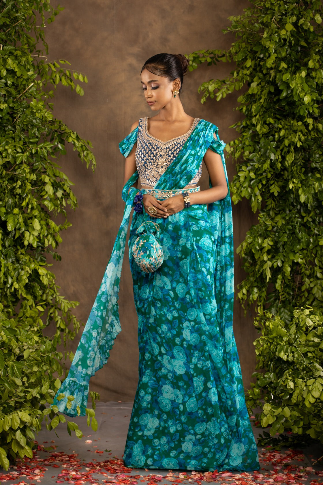Blue floral printed drape saree with navy blue raw silk blouse