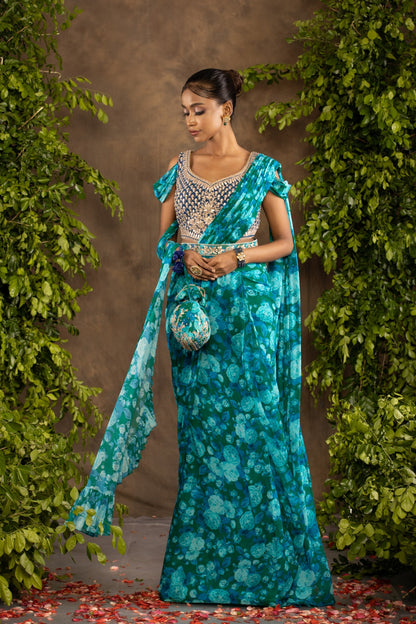 Blue floral printed drape saree with navy blue raw silk blouse