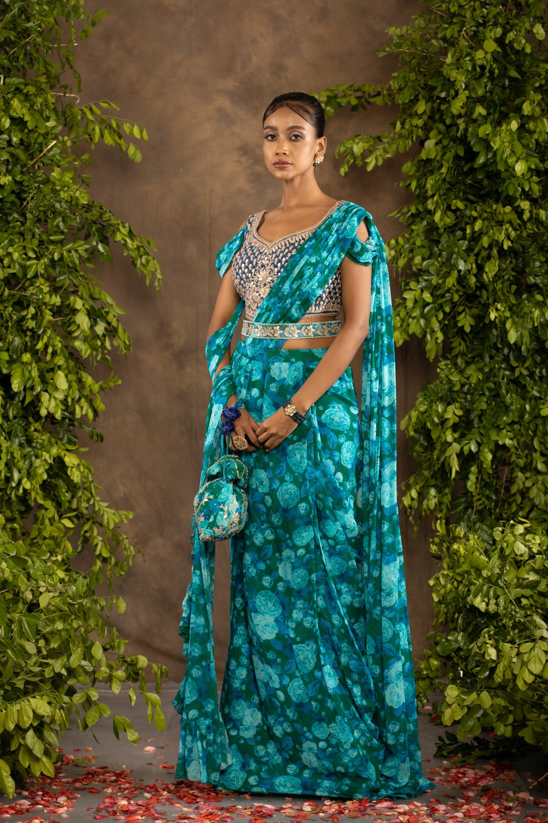 Blue floral printed drape saree with navy blue raw silk blouse