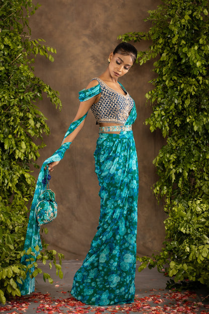 Blue floral printed drape saree with navy blue raw silk blouse