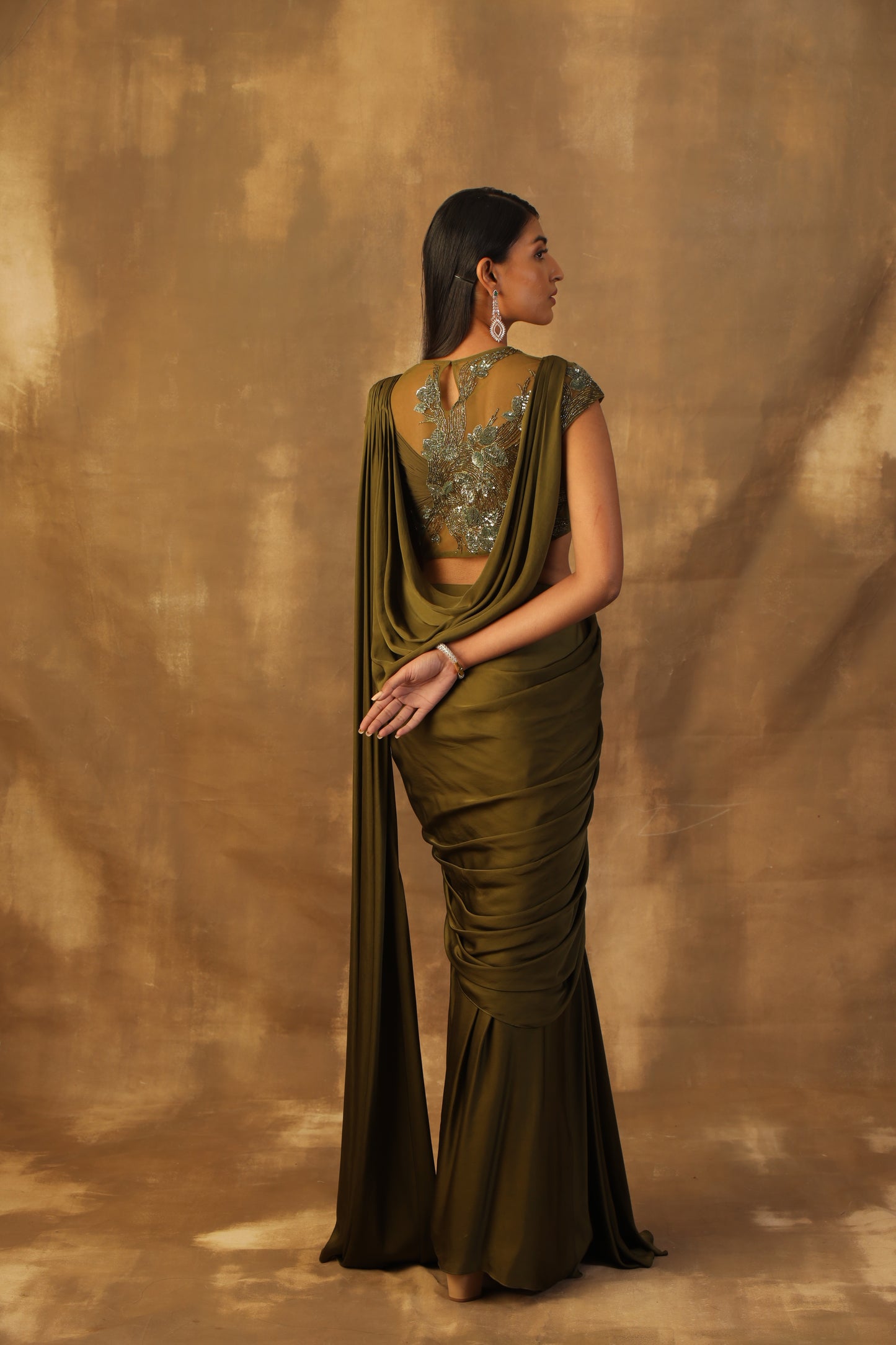 Mehndi green drape sari with rooshing and sequins embroidery blouse