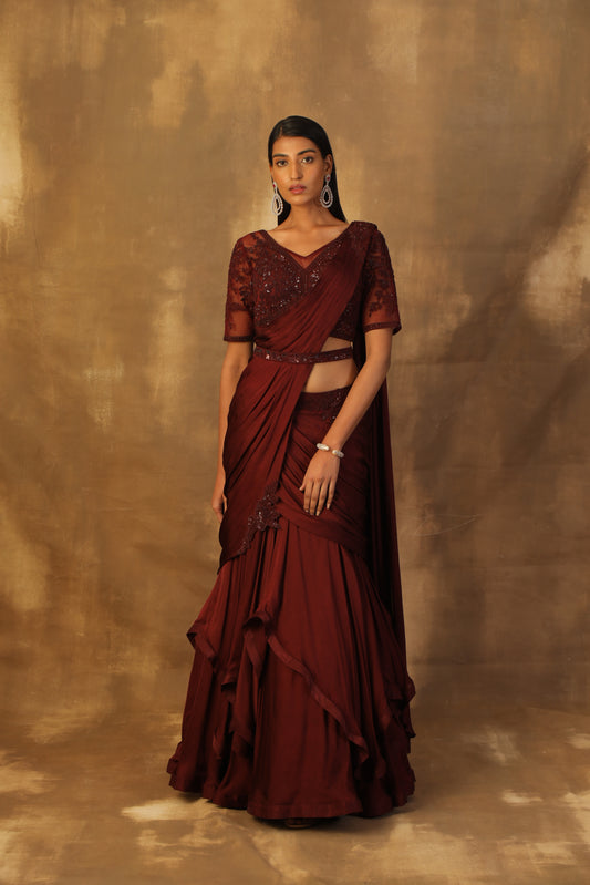 Wine drape lehnga sari with net blouse embroidered with dori and sequins