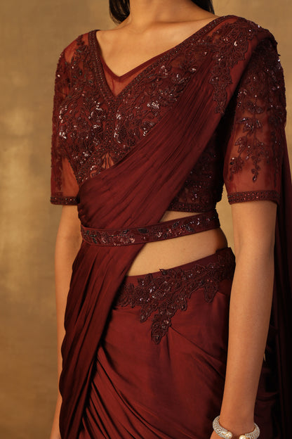 Wine drape lehnga sari with net blouse embroidered with dori and sequins