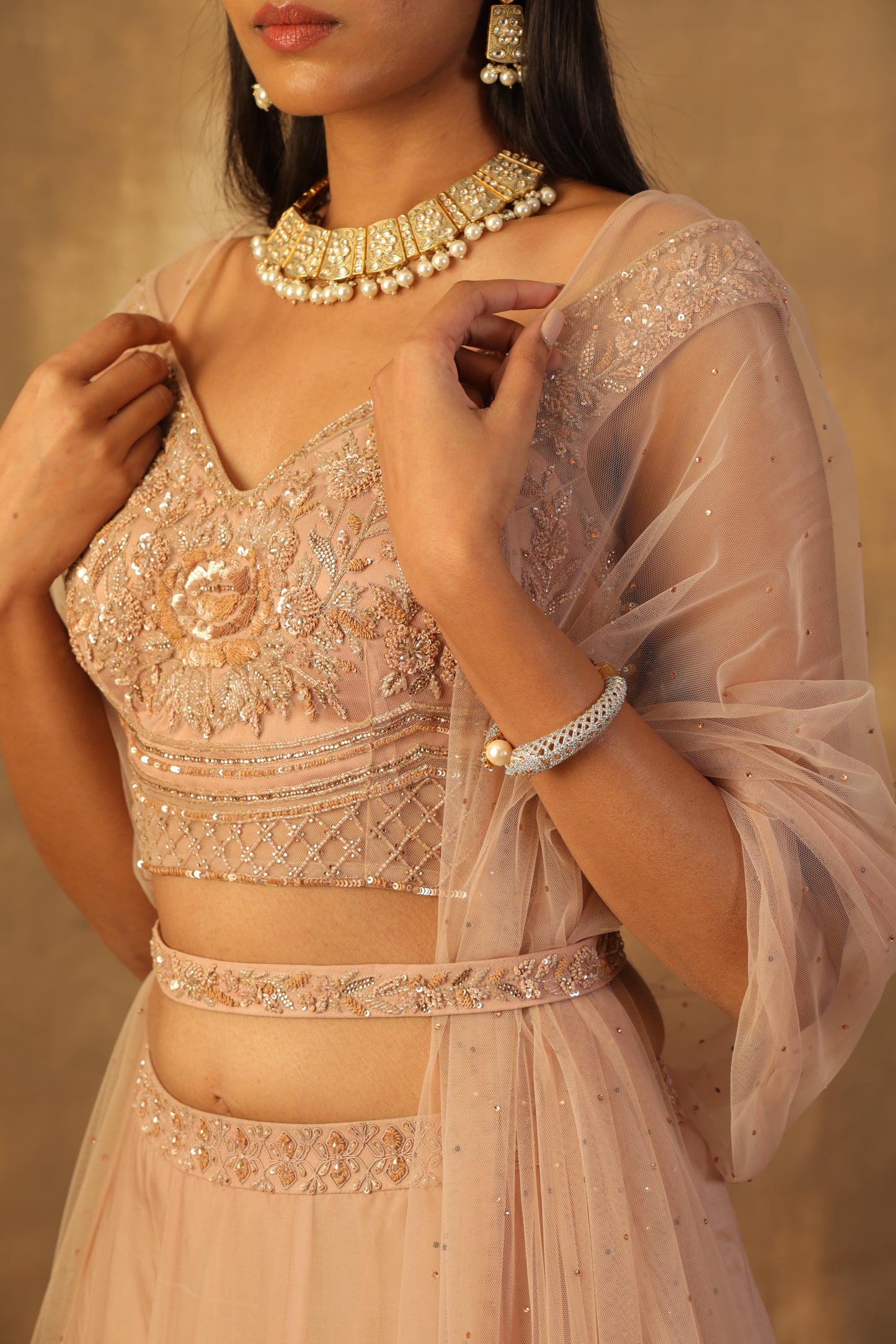 Dusty rose gold lehnga with blouse and dupatta
